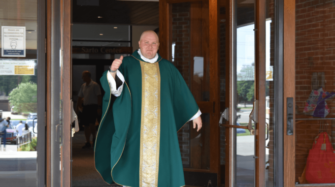 Fr. Durkee Pastor Exits The Church With A Thumbs Up.